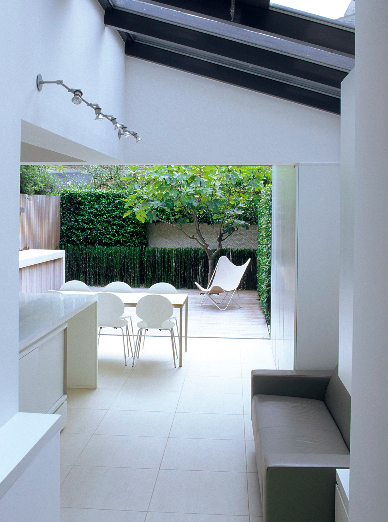 Fulham Courtyard long view from kitchen interior James Aldridge Landscape and Garden Design