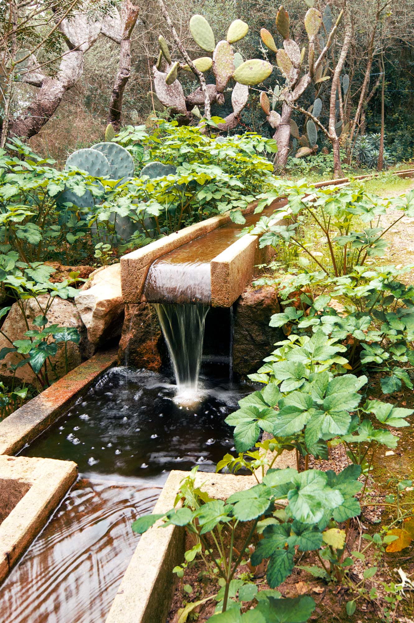 Dramatic 100meter long limestone rill in a Mallorca garden - James Aldridge Landscape and Garden Design